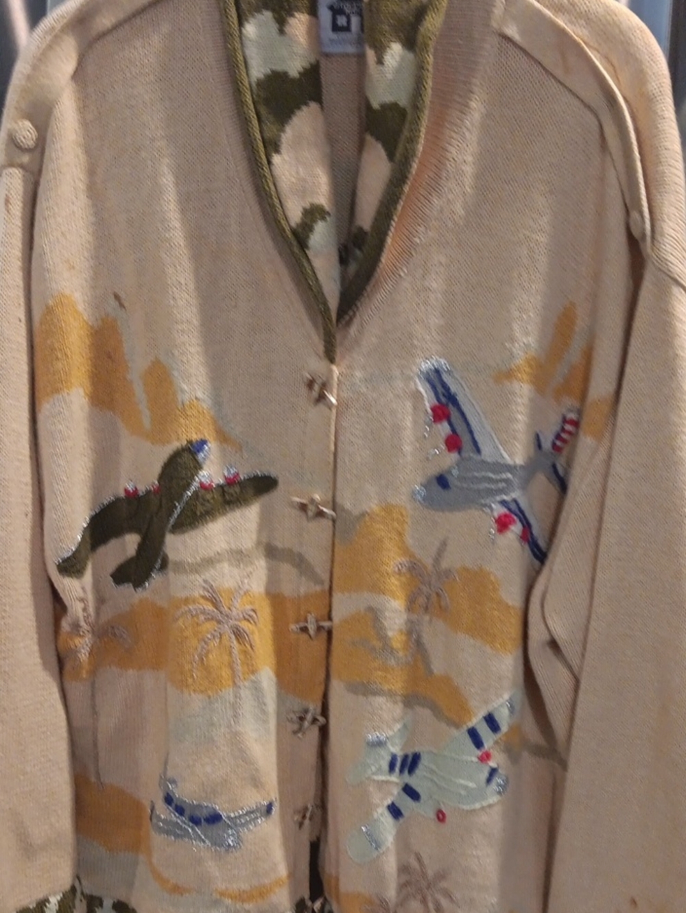 Storybook Knits Beige Cardigan with Gold, Olive & Blue Airplane Motif